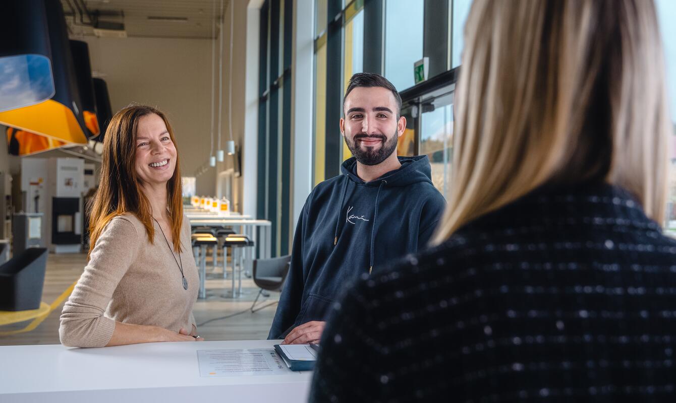 Customers at the service desk