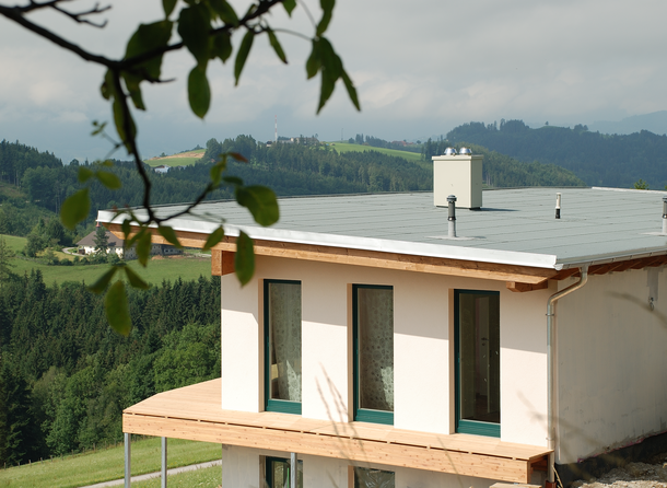 Roof with a ceramic chimney