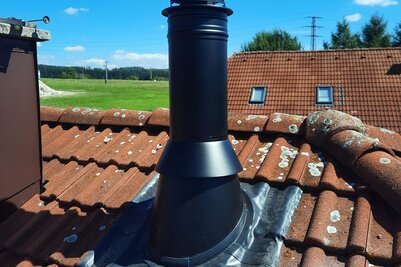 Vyústenie komína PERMETER nad strechou