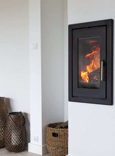 CELSIUS – plassbesparende peisovn med effektiv varmefordeling og moderne design.